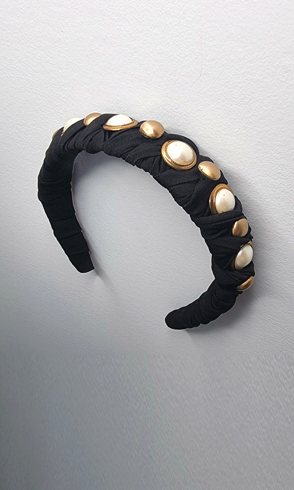 Another angle of the Meet Cute As A Button headband, showcasing its elegant design for effortless styling, with or without hair loss
