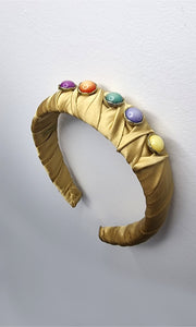 Meet Cute As A Button headband in gold, a stylish and comfortable accessory perfect for both hair styling and hair loss coverage